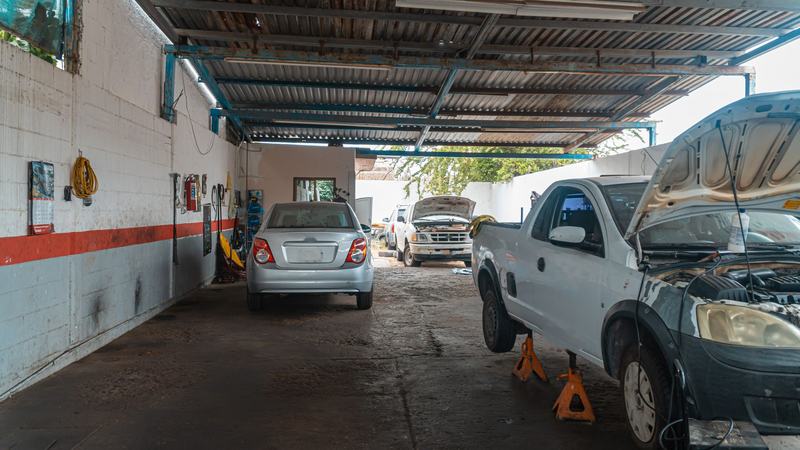 Sample photo: cars parked under a covered service bay